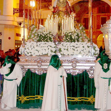 Dentists working on a young boys mouth