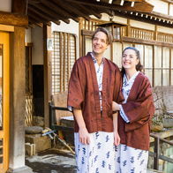 Couple wearing traditional Japanese outfit.