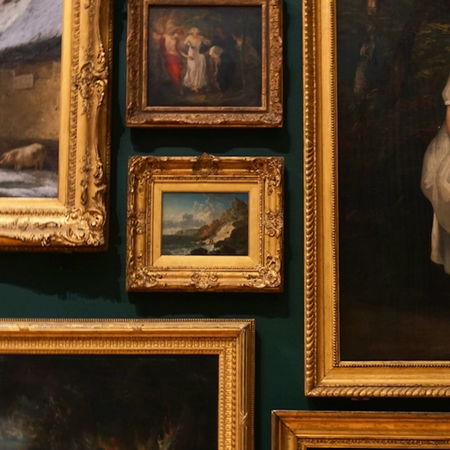 V16 emergency warning light flashing on top of a car stopped on the roadside in Spain.