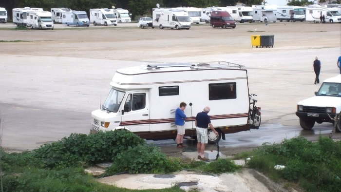 More motorhomes, camper vans and caravans arriving.