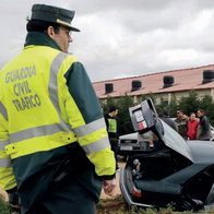 Guardia Civil officer at scene of car crash after vehicle left the road in Spain