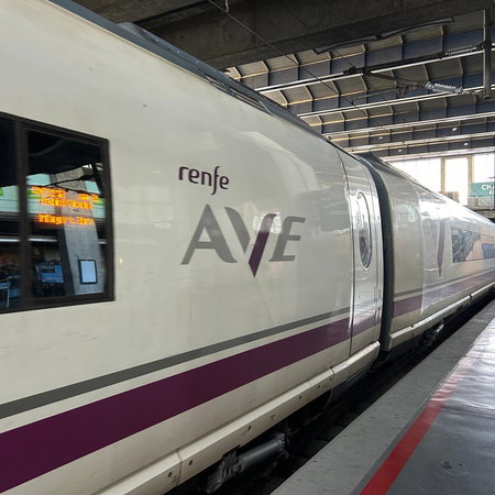 Renfe AVE high speed train at a station as Madrid Málaga direct service returns in Spain