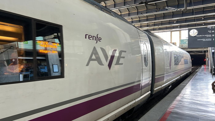Renfe AVE high speed train at a station as Madrid Málaga direct service returns in Spain