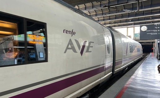 Renfe AVE high speed train at a station as Madrid Málaga direct service returns in Spain