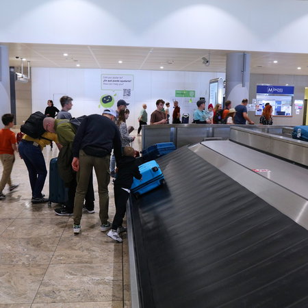 American expat checking Social Security documents in Spain