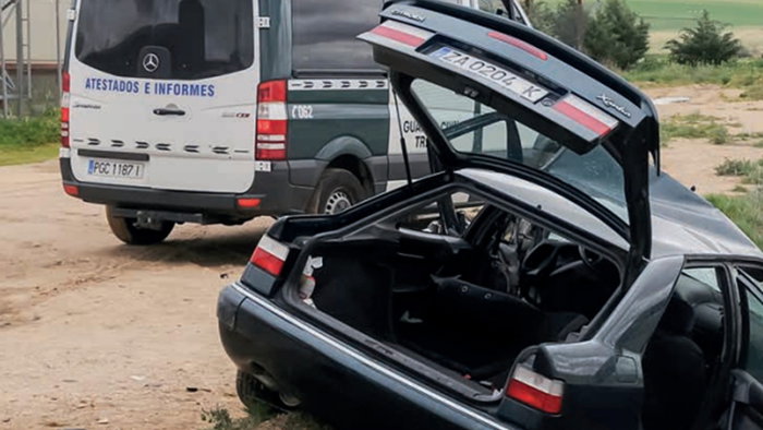 Car crashed off the road with Guardia Civil traffic unit attending the scene in Spain