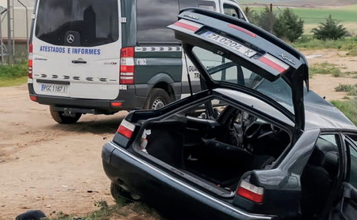 Car crashed off the road with Guardia Civil traffic unit attending the scene in Spain