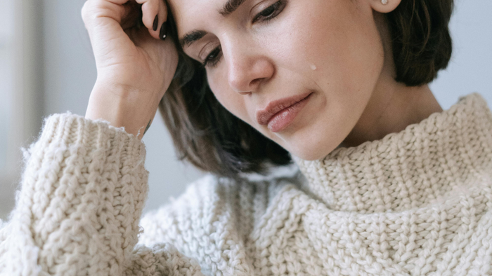 Woman looking at mobile phone.