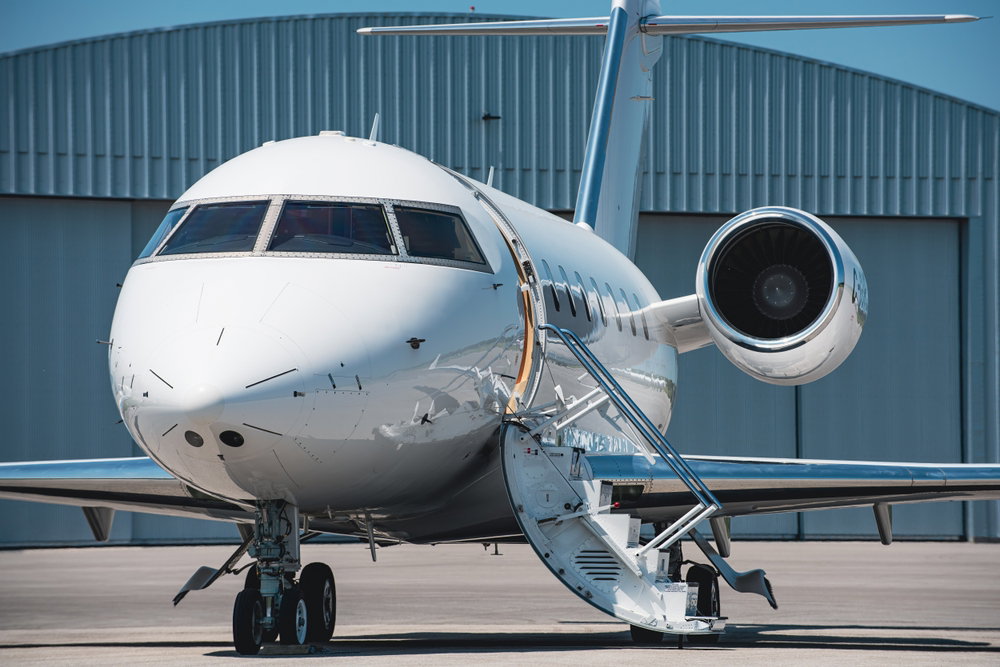 View of a private jet airplane on the airfield 
