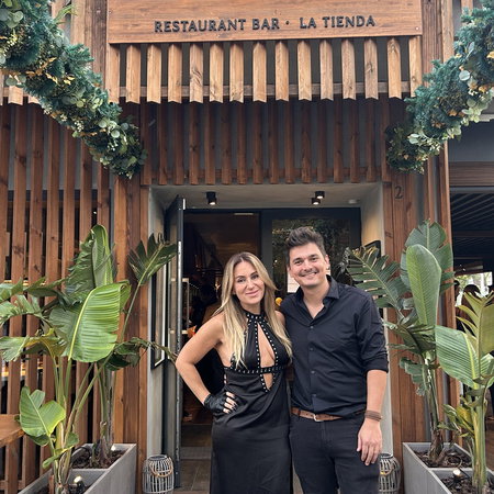 Sole & Lucas at the entrance of their inspired Pauza