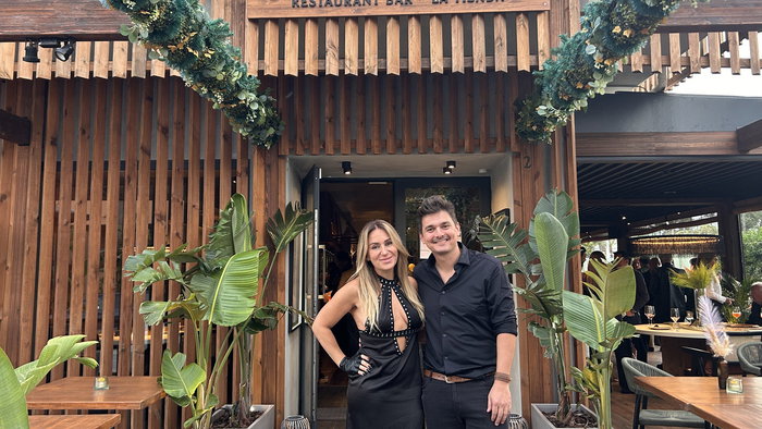 Sole & Lucas at the entrance of their inspired Pauza