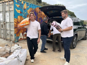 lugging bags of food