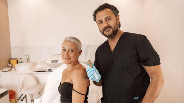 Dr Arvin Yarllahi from CellOrtho with a patient in his clinic