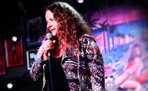 Comedian Lucy Aman performs comedy
