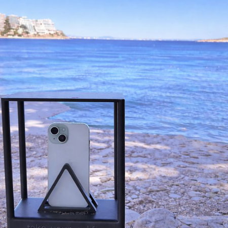 Stressed man looking out the window of his car