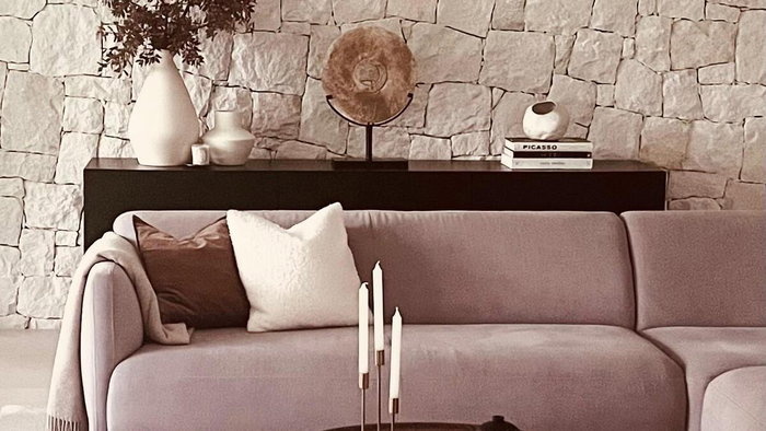 Current interior design trends featuring soft earthy tones.