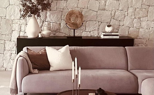 Current interior design trends featuring soft earthy tones.