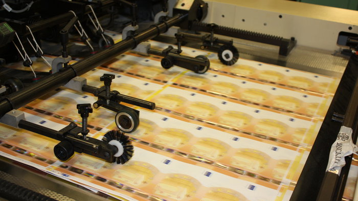 Bank notes being printed out