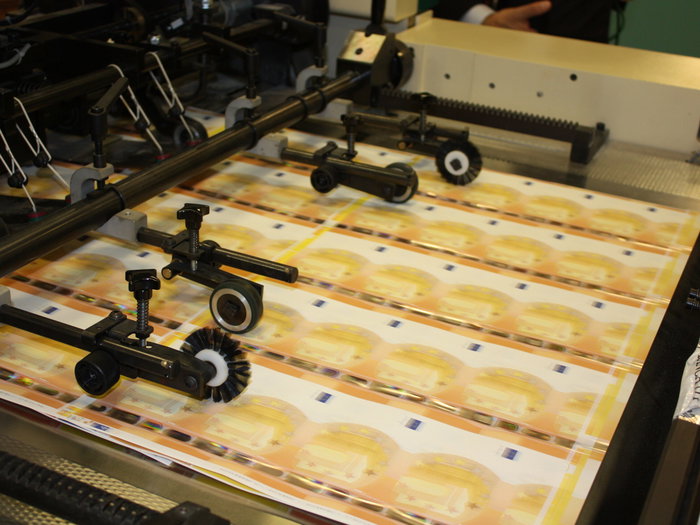 Bank notes being printed out