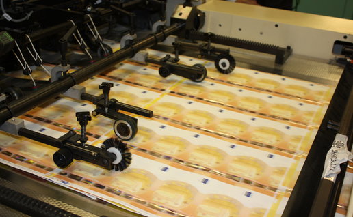 Bank notes being printed out