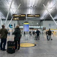 Passengers inside Santiago de Compostela Airport terminal before temporary closure