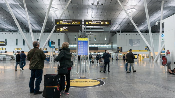 Passengers inside Santiago de Compostela Airport terminal before temporary closure