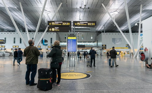 Passengers inside Santiago de Compostela Airport terminal before temporary closure