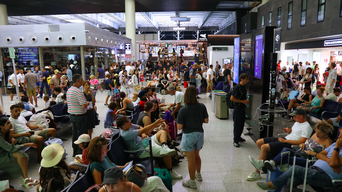 Passengers stranded at an airport after flights are cancelled