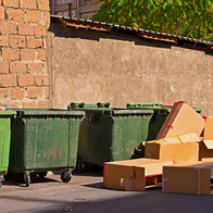 Boxes by rubbish bins