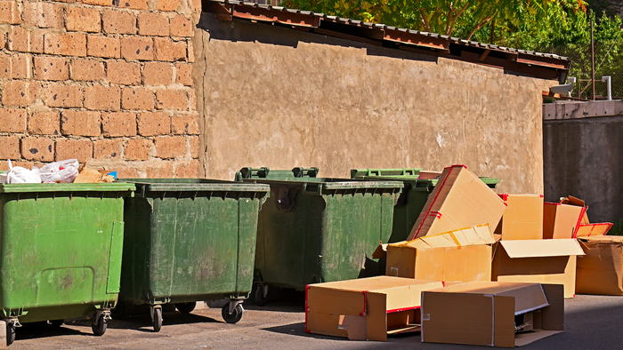 Boxes by rubbish bins