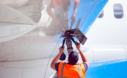 Man putting fuel into an aircraft