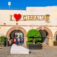 An arch in the street with an I love Gibraltar sign above it