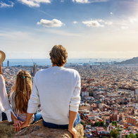 Family overlooking Barcelona skyline as Spain unveils new hotels, attractions and travel changes for 2026
