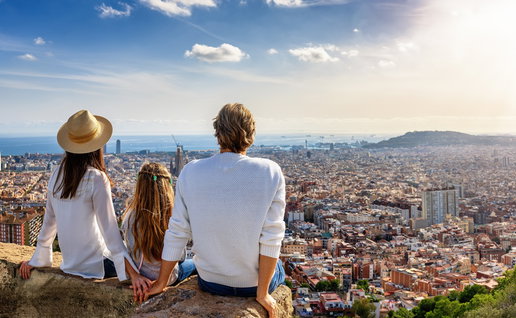 Family overlooking Barcelona skyline as Spain unveils new hotels, attractions and travel changes for 2026