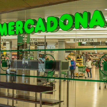 Mercadona supermarket entrance in Spain as shoppers check May holiday opening hours