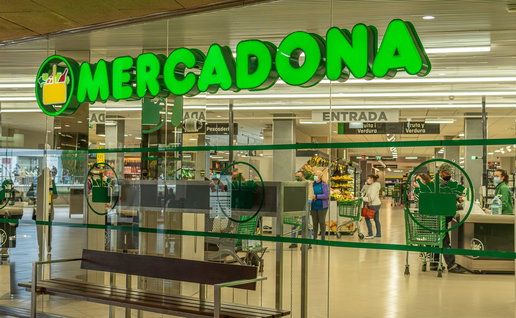 Mercadona supermarket entrance in Spain as shoppers check May holiday opening hours