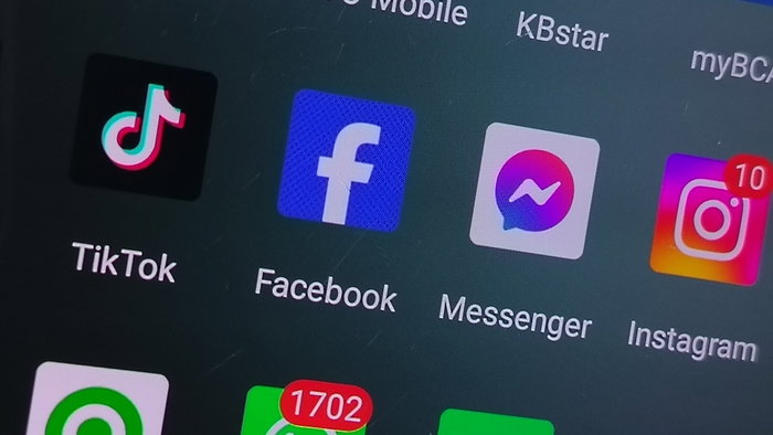 TikTok, Instagram, Facebook and messaging apps shown on smartphone screen