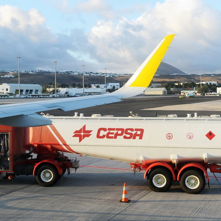 Aircraft being refuelled by fuel truck at Spanish airport amid flight supply concerns