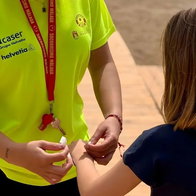 safety wristbands for children and vunerable adults being handed out at Marbella beach