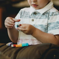 A child playing with blocks.
