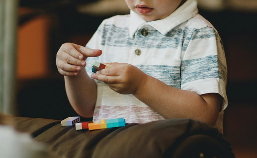 A child playing with blocks.
