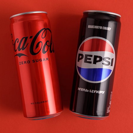 Coca cola and pepsi cans