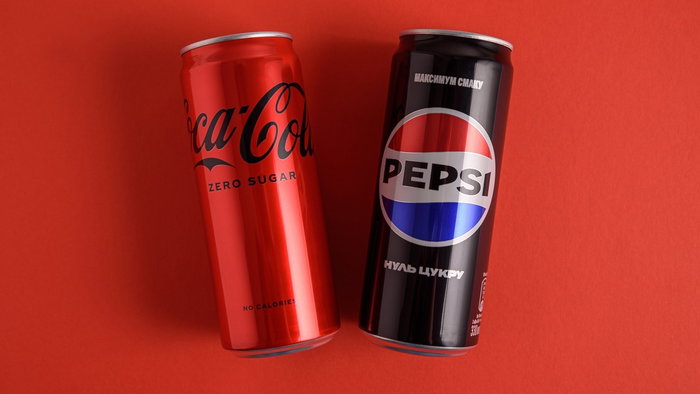 Coca cola and pepsi cans