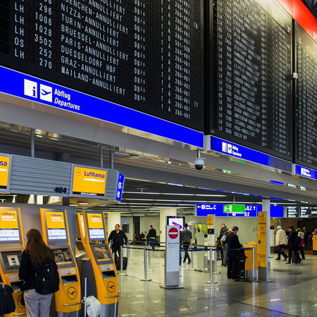 Lufthansa airport departure board showing multiple flight cancellations