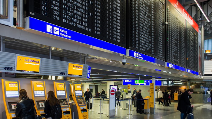 Lufthansa airport departure board showing multiple flight cancellations