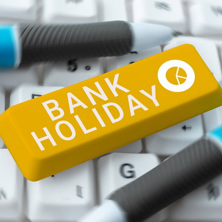 Computer keyboard with a yellow key labelled bank holiday