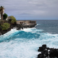 Dark clouds gathering over Puerto de la Cruz coastline in Tenerife before rain