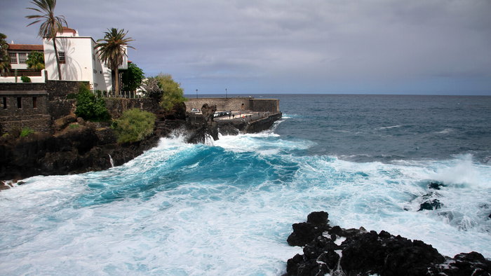 Dark clouds gathering over Puerto de la Cruz coastline in Tenerife before rain