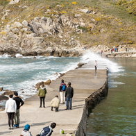 People walking along the seafront in Vigo, one of Spain’s top cities for English speakers
