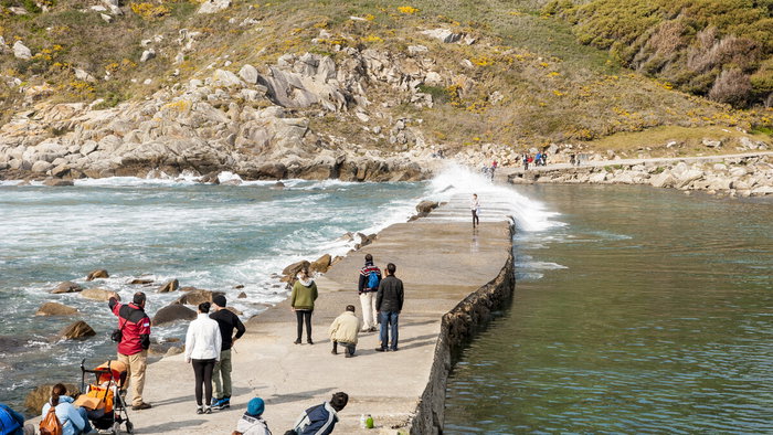 People walking along the seafront in Vigo, one of Spain’s top cities for English speakers